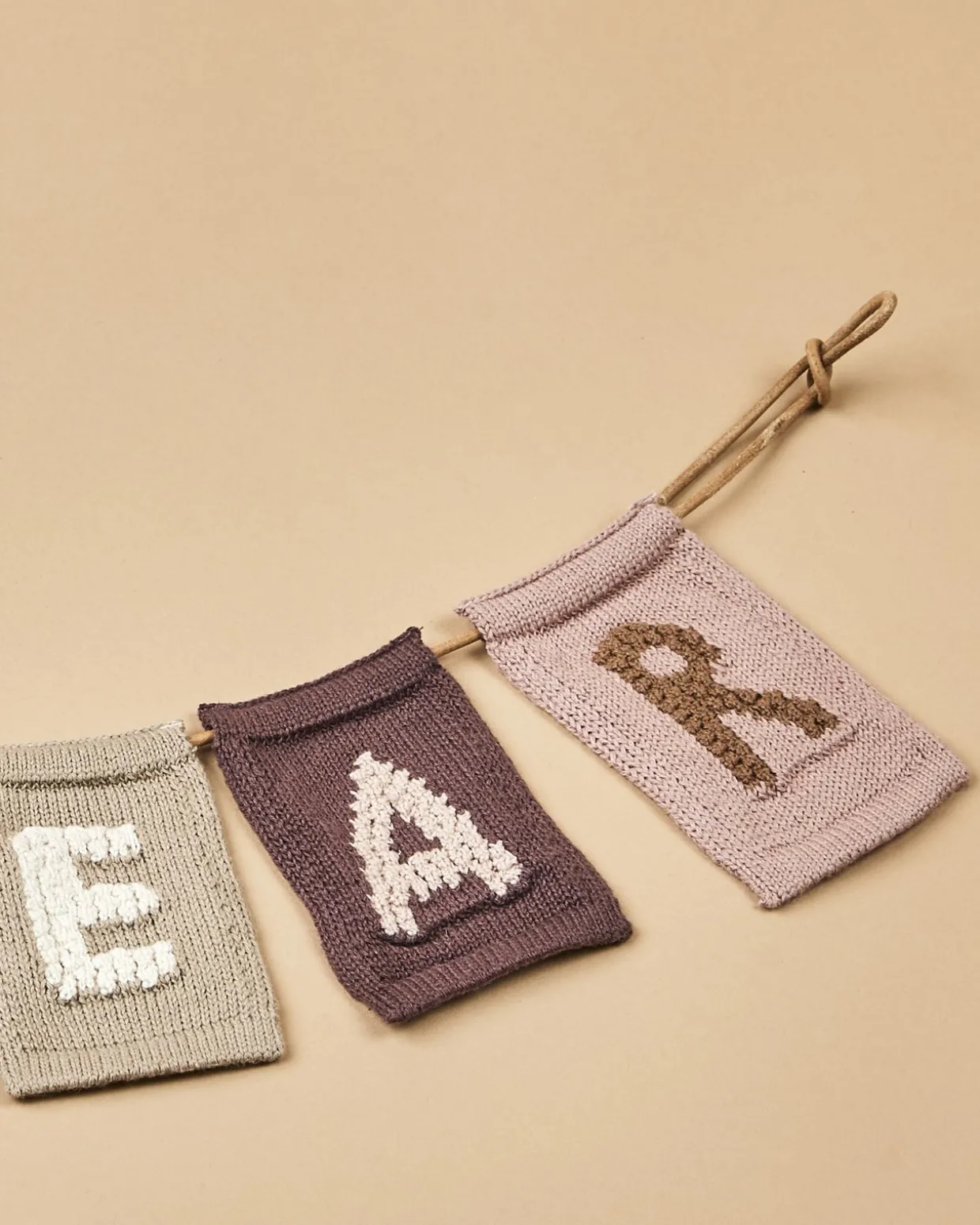 Strikket bogstav A, rosa