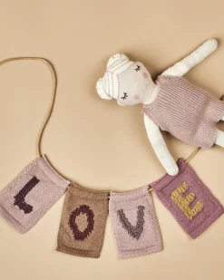 Strikket bogstav O, rosa