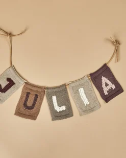 Strikket bogstav U, rosa