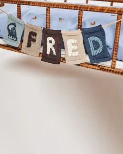 Strikket flag, dino, blå